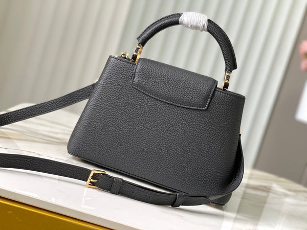 capucines bb 27 black taurillon leather gold hardware