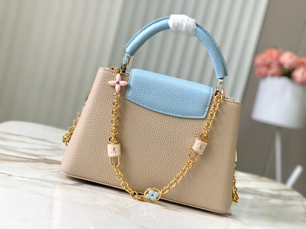 capucines bb 27 beige cloud blue taurillon leather gold hardware