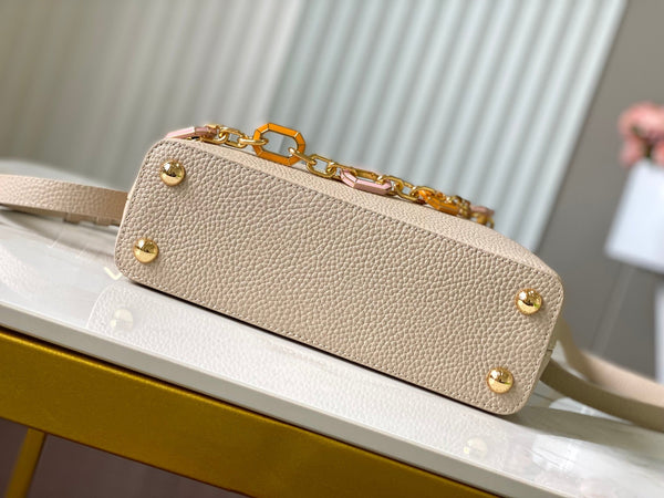 CAPUCINES BB 27CM BEIGE TAURILLON LEATHER