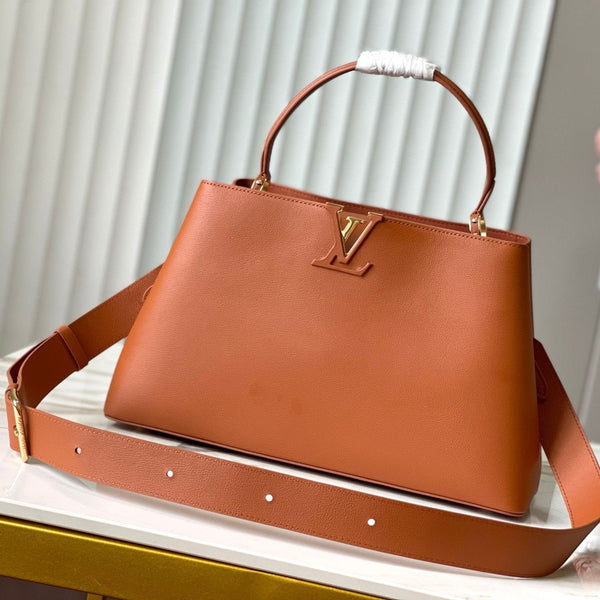 CAPUCINES GM 38CM BROWN ORANGE TAURILLON LEATHER