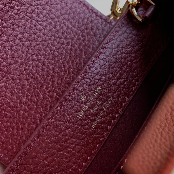 CAPUCINES MINI 21 BURGUNDY TAURILLON GOLD HARDWARE