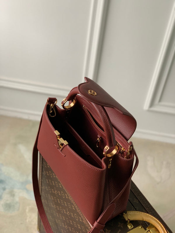 CAPUCINES MINI 21 BURGUNDY TAURILLON GOLD HARDWARE