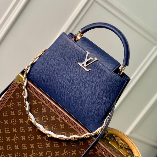 capucines mm 31.5 dark blue taurillon leather gold hardware