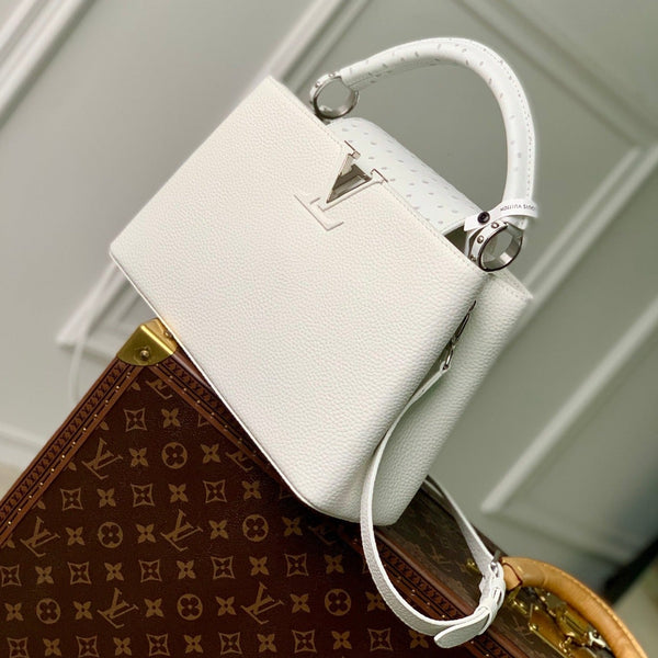 capucines mm 31.5 white taurillon leather silver hardware