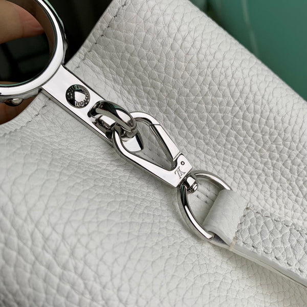 capucines mm 31.5 white taurillon leather silver hardware