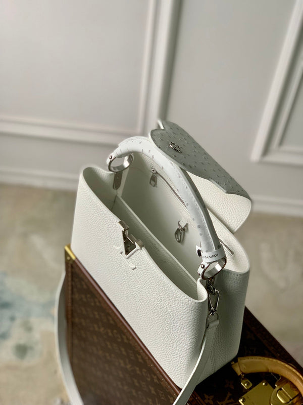 capucines mm 31.5 white taurillon leather silver hardware