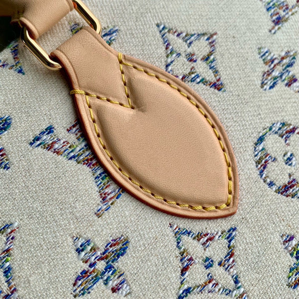 Lv OntheGo MM Beige Leather White Monogram jacquard fabric
