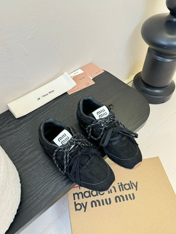 Sneaker Miu x NB in pelle scamosciata nera 235809