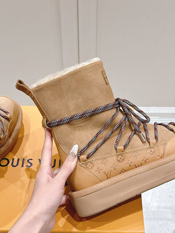 STIVALETTO CON PLATEAU ASPEN IN CAMOSCIO E SHEARLING CON MONOGRAMMA MARRONE SIDRO