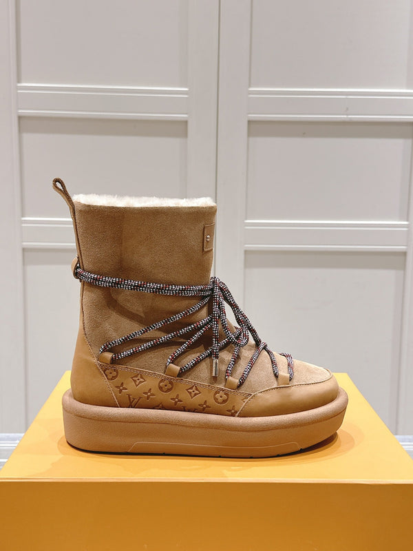 STIVALETTO CON PLATEAU ASPEN IN CAMOSCIO E SHEARLING CON MONOGRAMMA MARRONE SIDRO