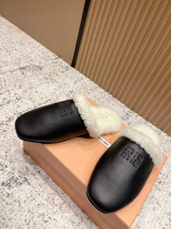 Miu Shearling-Lined Mules Black Cowhide 481432