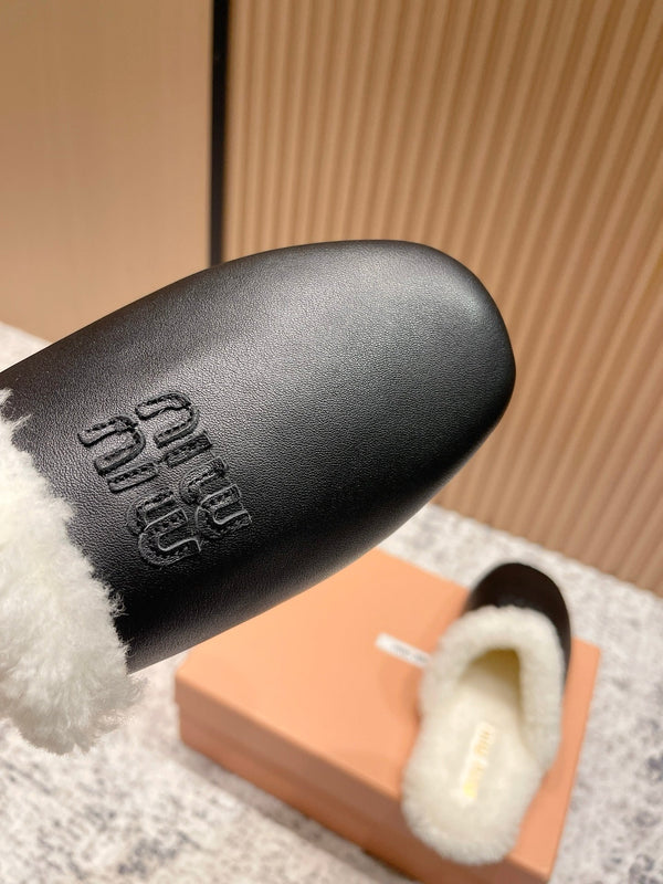 Miu Shearling-Lined Mules Black Cowhide 481432