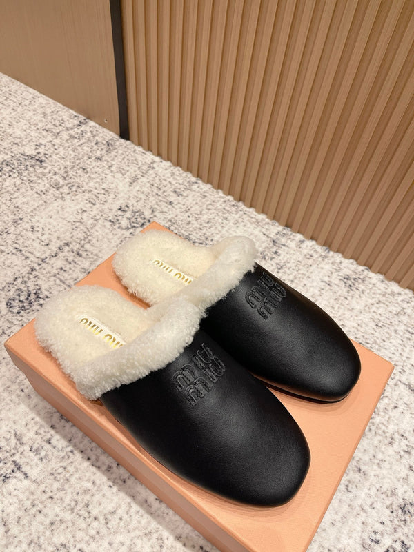 Miu Shearling-Lined Mules Black Cowhide 481432