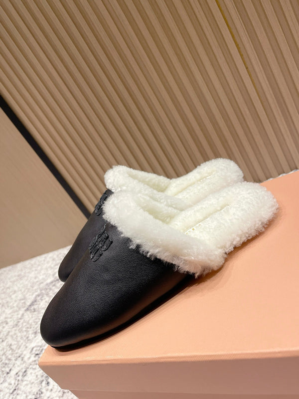 Miu Shearling-Lined Mules Black Cowhide 481432