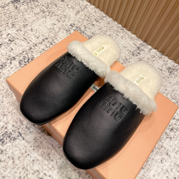 Miu Shearling-Lined Mules Black Cowhide 481432