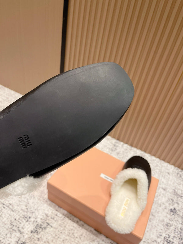 Miu Shearling-Lined Mules Black Cowhide 481432