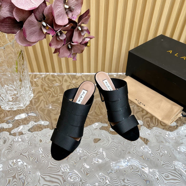 ALAIA ELASTIC CAGE MULE SANDALS IN BLACK WOVEN STRAP AND LAMBSKIN