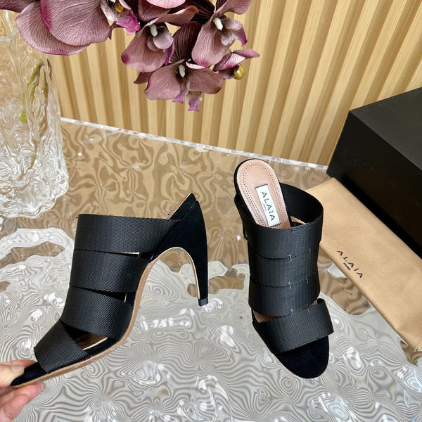 ALAIA ELASTIC CAGE MULE SANDALS IN BLACK WOVEN STRAP AND LAMBSKIN