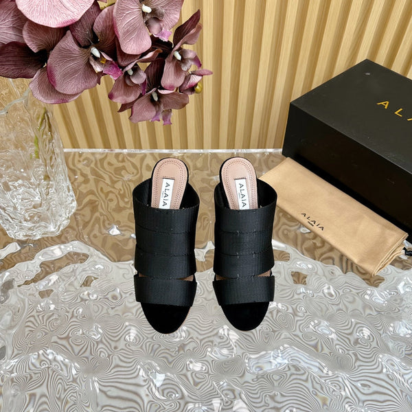 ALAIA ELASTIC CAGE MULE SANDALS IN BLACK WOVEN STRAP AND LAMBSKIN