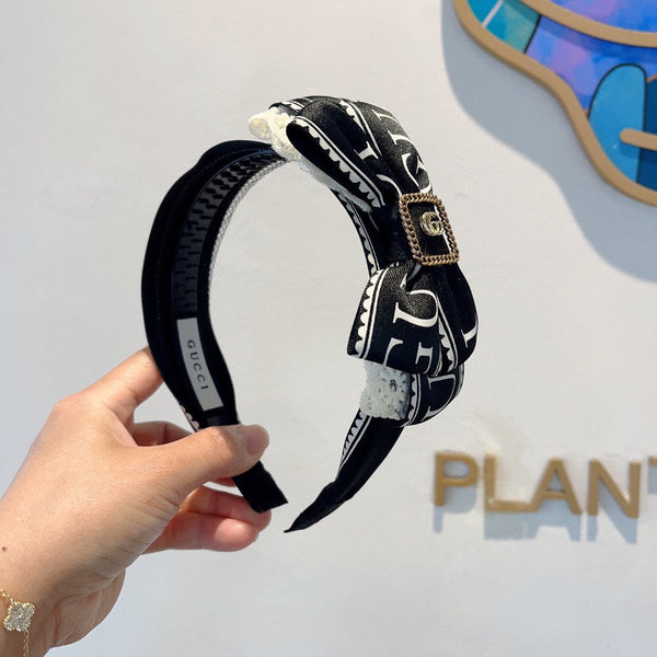 BOW HAIRBAND IN BLACK MIX WHITE RESIN AND FABRIC 432749