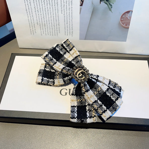 RETRO BOW HAIR CLIP IN BLACK MIX WHITE TWEED 432763