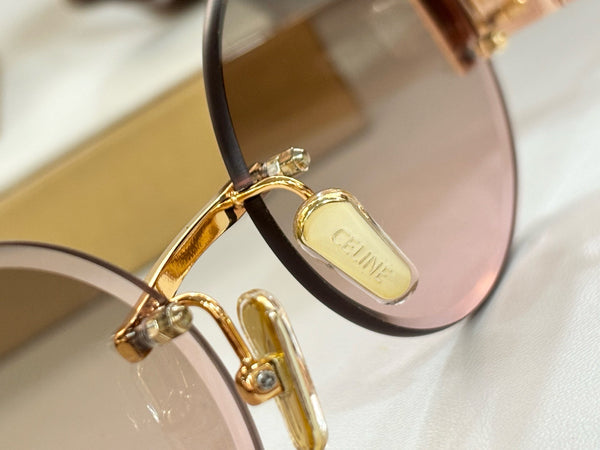 TRIOMPHE SUNGLASS CL42121U IN METAL