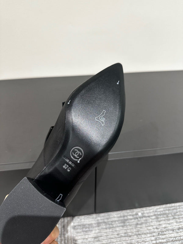 Stivaletti CC con fiocco nero in pelle di mucca