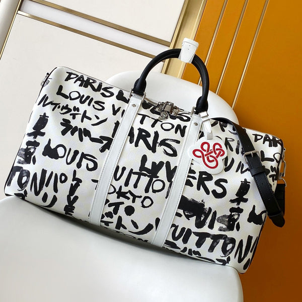 LVx N&PW Keepall Bandoulière 50 Black White Cowhide