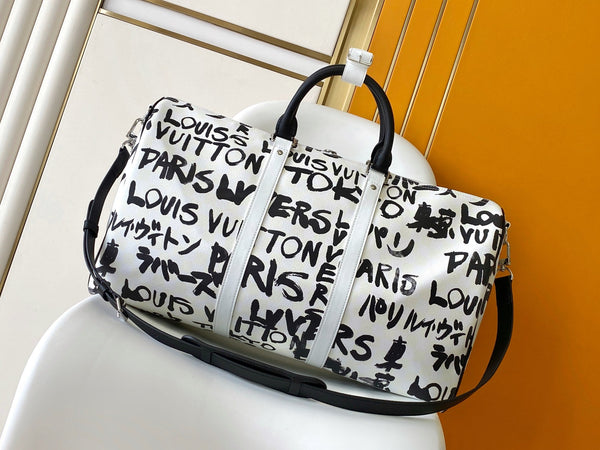 LVx N&PW Keepall Bandoulière 50 Black White Cowhide