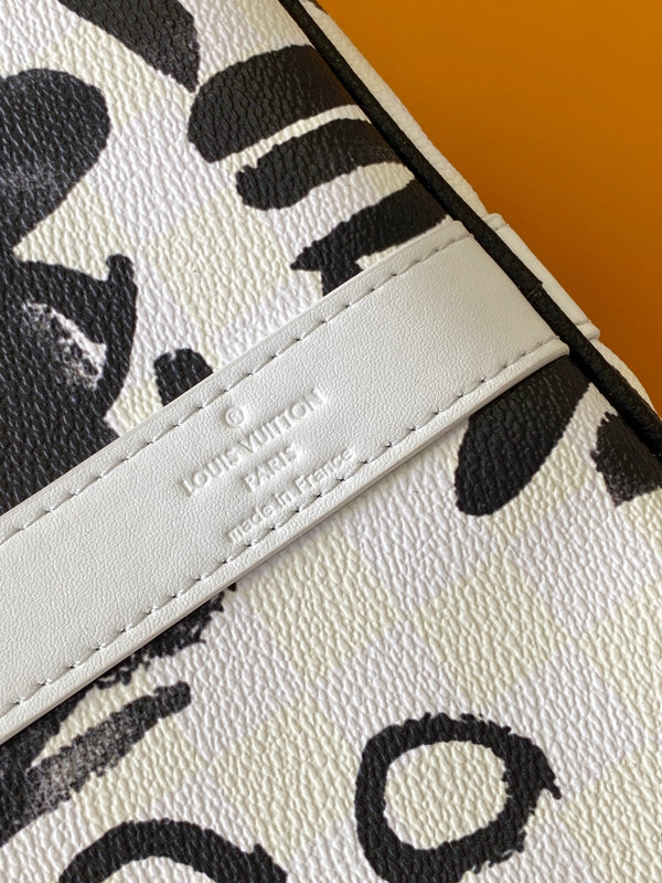 LVx N&PW Keepall Bandoulière 50 Black White Cowhide