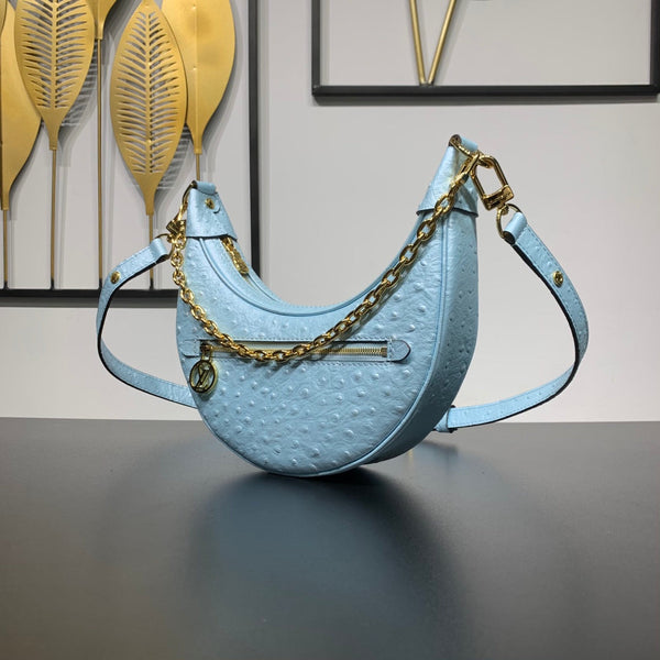 LOOP 23 IN PELLE DI STRUZZO BLU POTENTE CON FERRAMENTA ORO