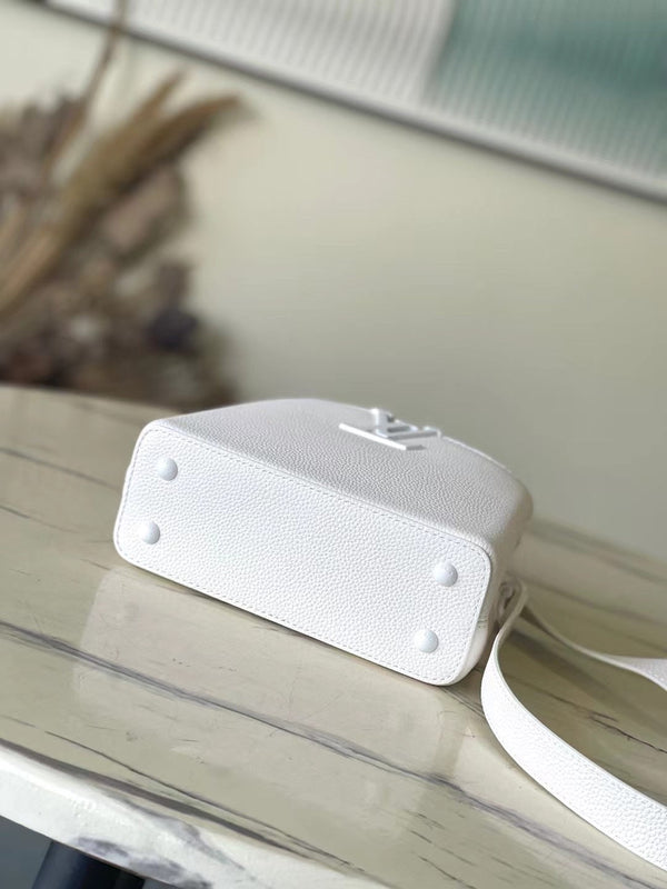 CAPUCINES EAST-WEST MINI 21 IN TAURILLON BIANCO