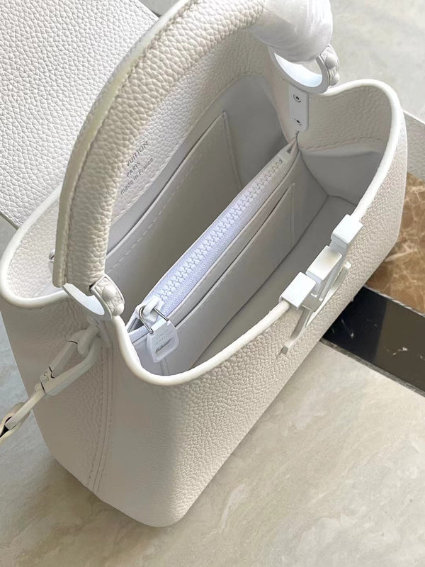 CAPUCINES EAST-WEST MINI 21 IN TAURILLON BIANCO