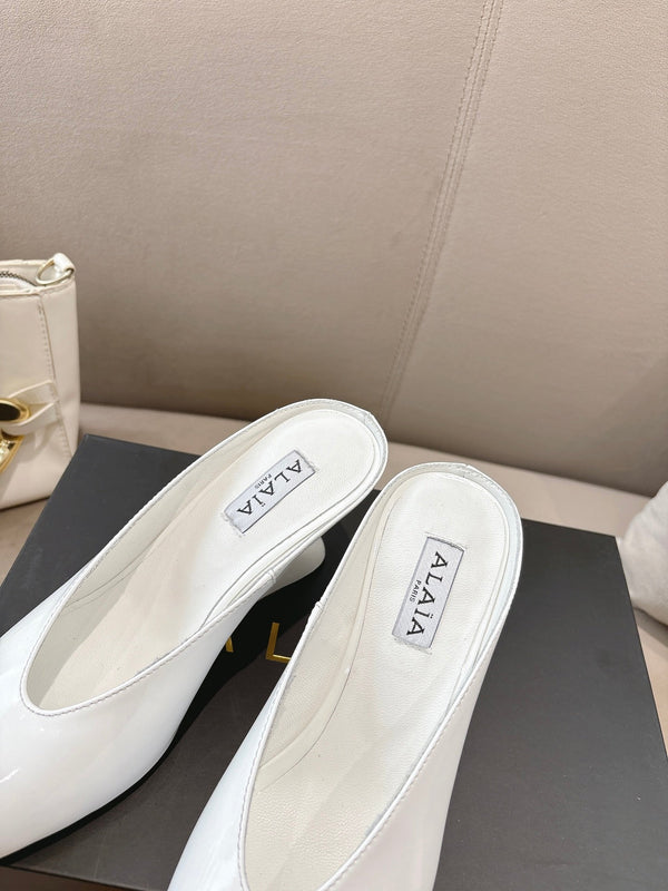 Alaia 25 Curve Wedge Mules White Lambskin 293554