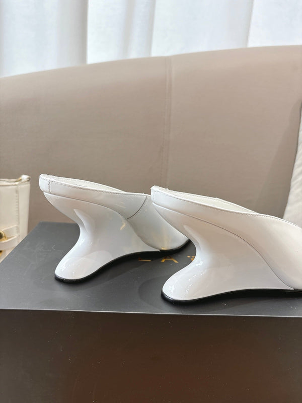 Alaia 25 Curve Wedge Mules White Lambskin 293554