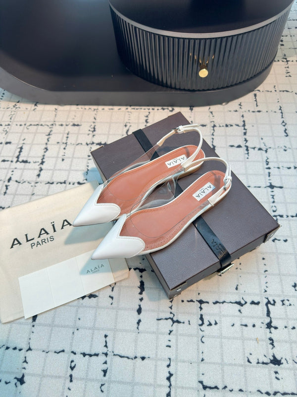 ALAIA FLAT SLINGBACK IN WHITE PATENT CALFSKIN AND FILM