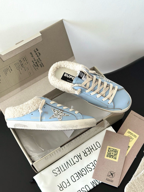 SUPER-STAR SABOTS IN BLUE CALFSKIN WITH GLITTER WHITE STAR