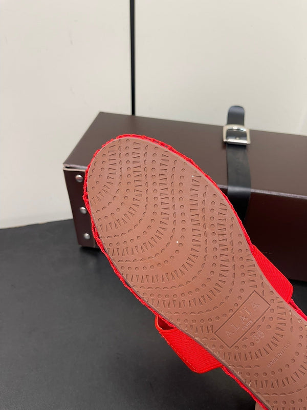 ALAIA BALLET FLATS IN CHERRY RED MESH FISHNET WITH GOLD HARDWARE