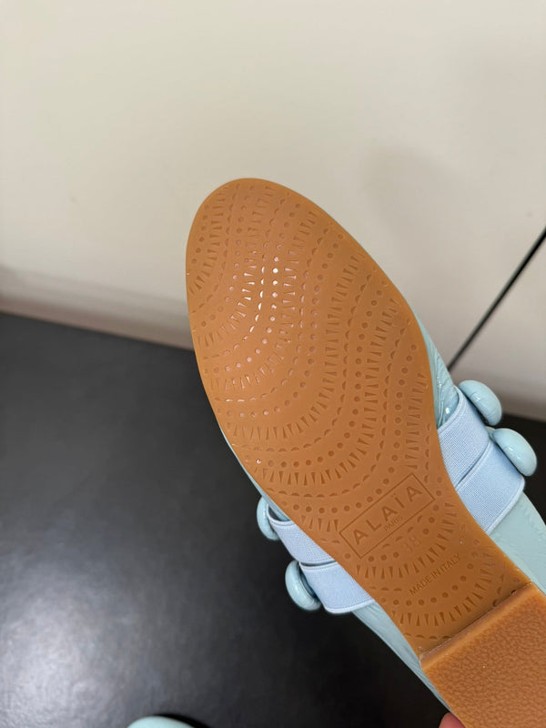 ALAIA SPHERE BALLET FLATS IN LIGHT BLUE LAMBSKIN