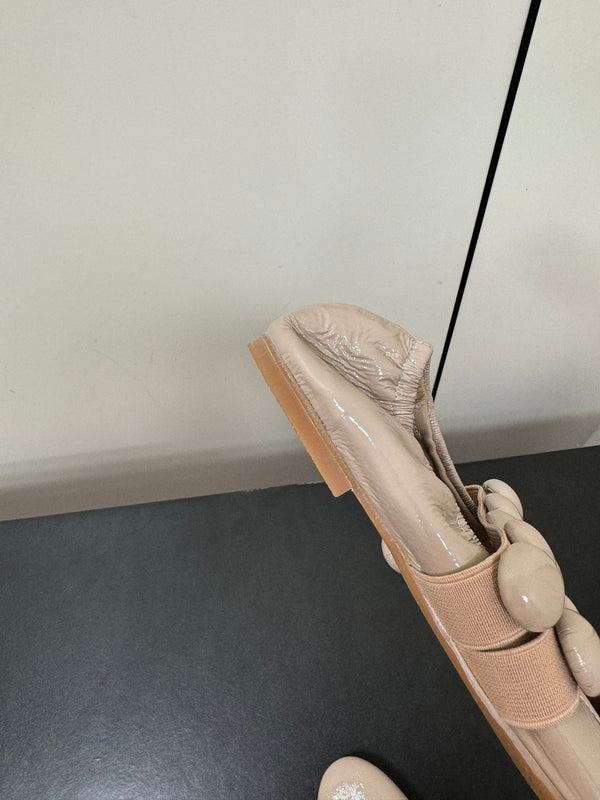 BALLERINE ALAIA SPHERE IN PELLE DI AGNELLO BEIGE MANDORLA