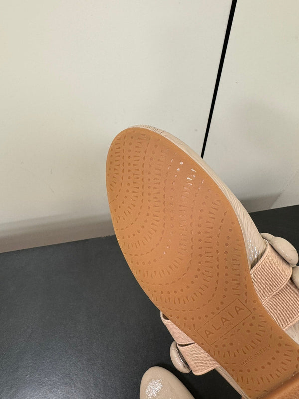 BALLERINE ALAIA SPHERE IN PELLE DI AGNELLO BEIGE MANDORLA