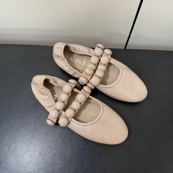 BALLERINE ALAIA SPHERE IN PELLE DI AGNELLO BEIGE MANDORLA