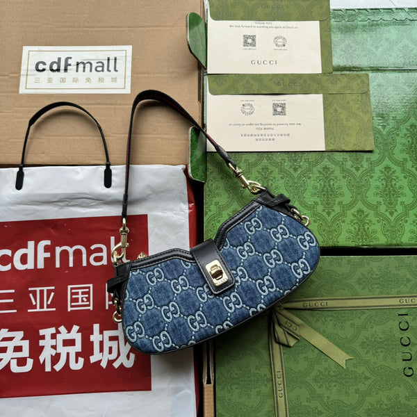 BORSA A TRACOLLA MOON SIDE 24 IN DENIM GOFFRATO BLU E BORDI IN PELLE DI VITELLO NERA, FERRAMENTA ORO