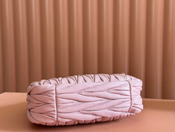 BORSA A MANO TRAPUNTATA WANDER 23 IN PELLE DI AGNELLO ROSA EUNRY