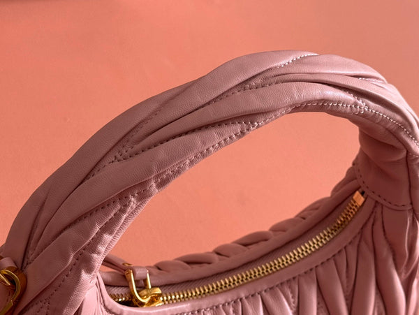 BORSA A MANO TRAPUNTATA WANDER 23 IN PELLE DI AGNELLO ROSA EUNRY