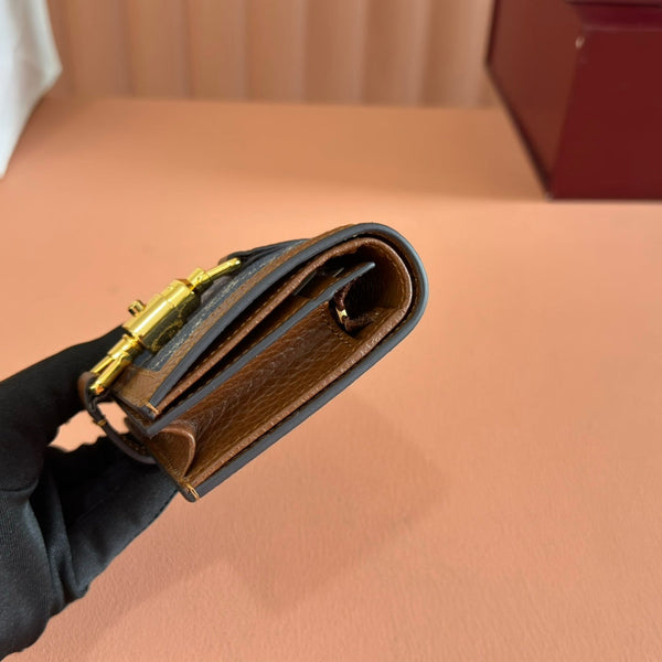 Portafoglio Gucci Jackie in tela e pelle blu marrone 255172