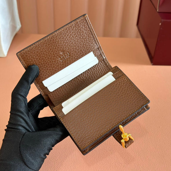 Portafoglio Gucci Jackie in tela e pelle blu marrone 255172