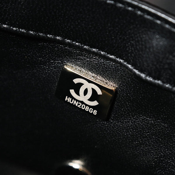 Borsa a patta 24S 20 cm in pelle di vitello con paillettes bianche e nere