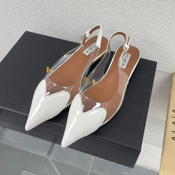 ALAIA LE COEUR FLAT SLINGBACKS IN WHITE PATENT LAMBSKIN