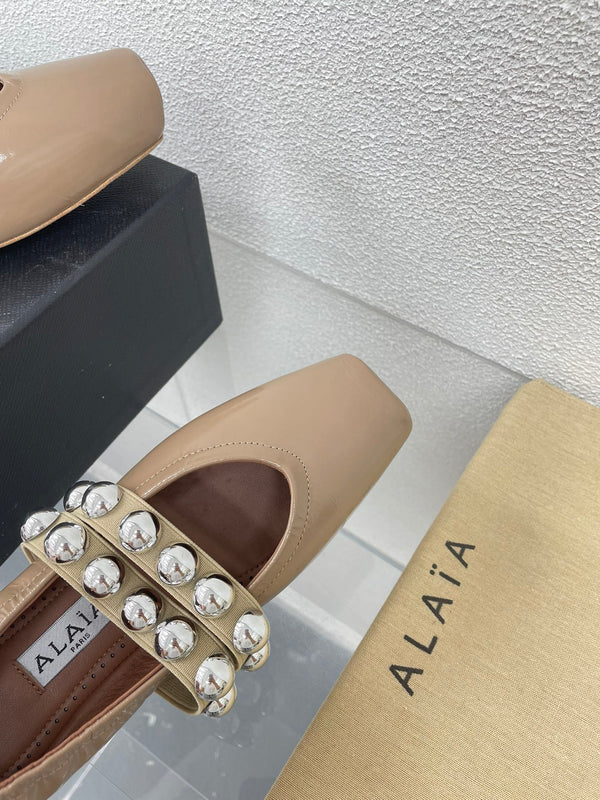 ALAIA MARY JANE PEARL IN GLOSSY BEIGE LAMBSKIN